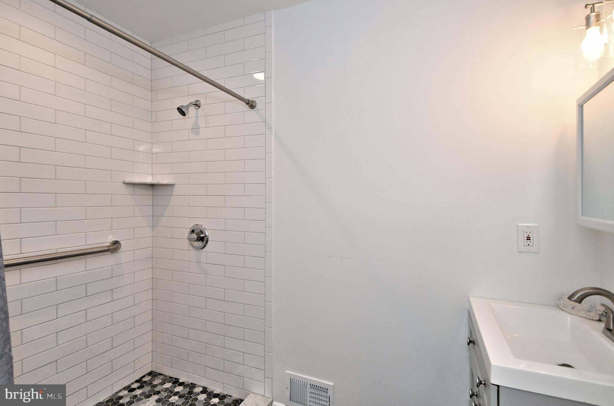 308 Paper Mill Road Oreland, PA 19075 - Photo 23 of 47 First floor bathroom w/ tile shower
