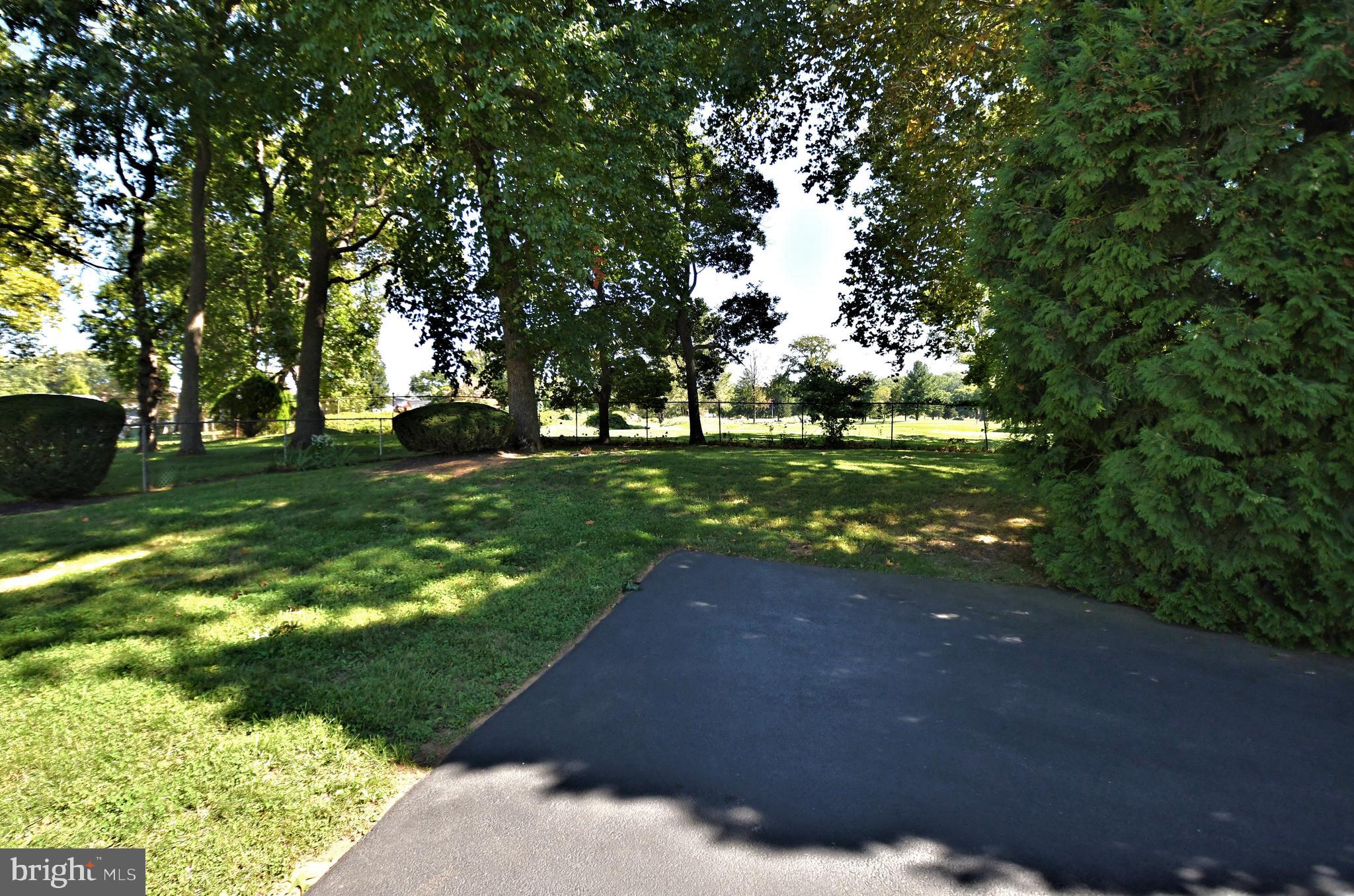 308 Paper Mill Road Oreland, PA 19075 - Photo 43 of 47 Driveway looking towards golf course