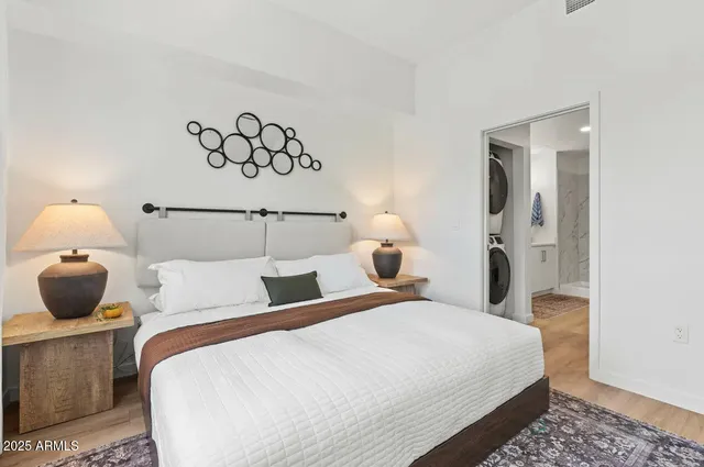 a bathroom with a sink a mirror and shower