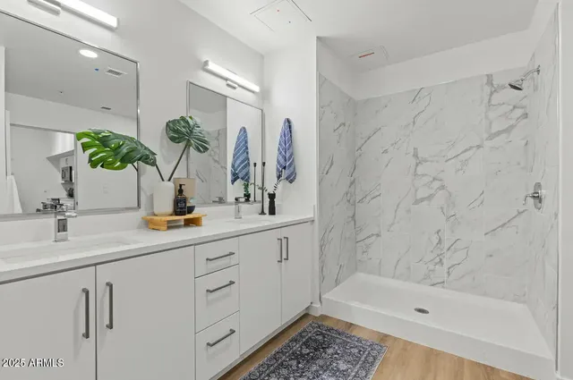 a bedroom with a washer and dryer