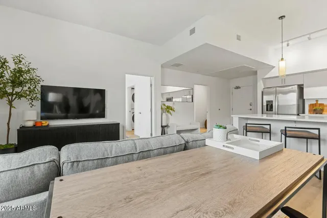 a bed room with a bed and a window