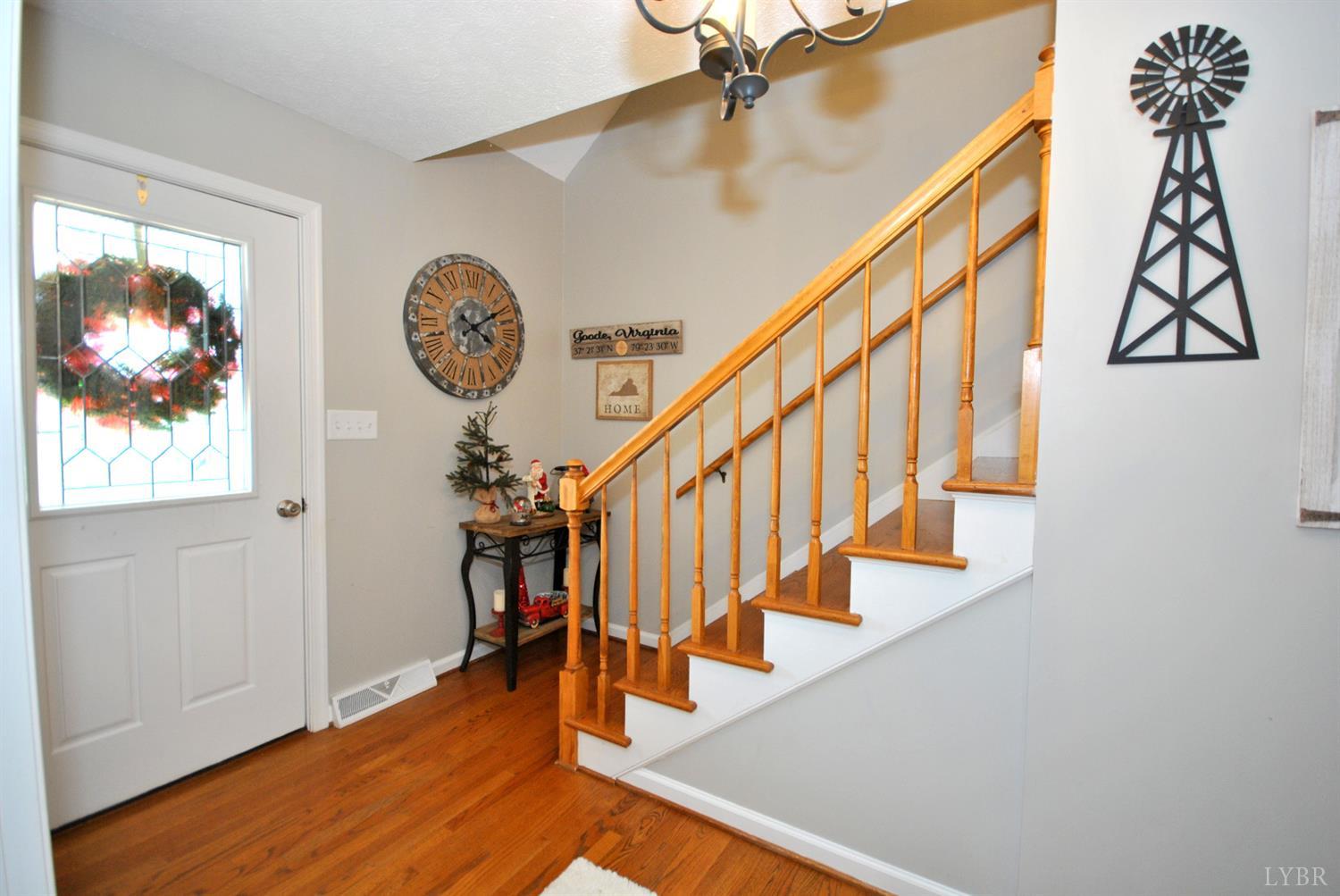 3350 Roaring Run Road Goode, VA 24556 - Photo 14 of 90 a view of entryway with wooden floor