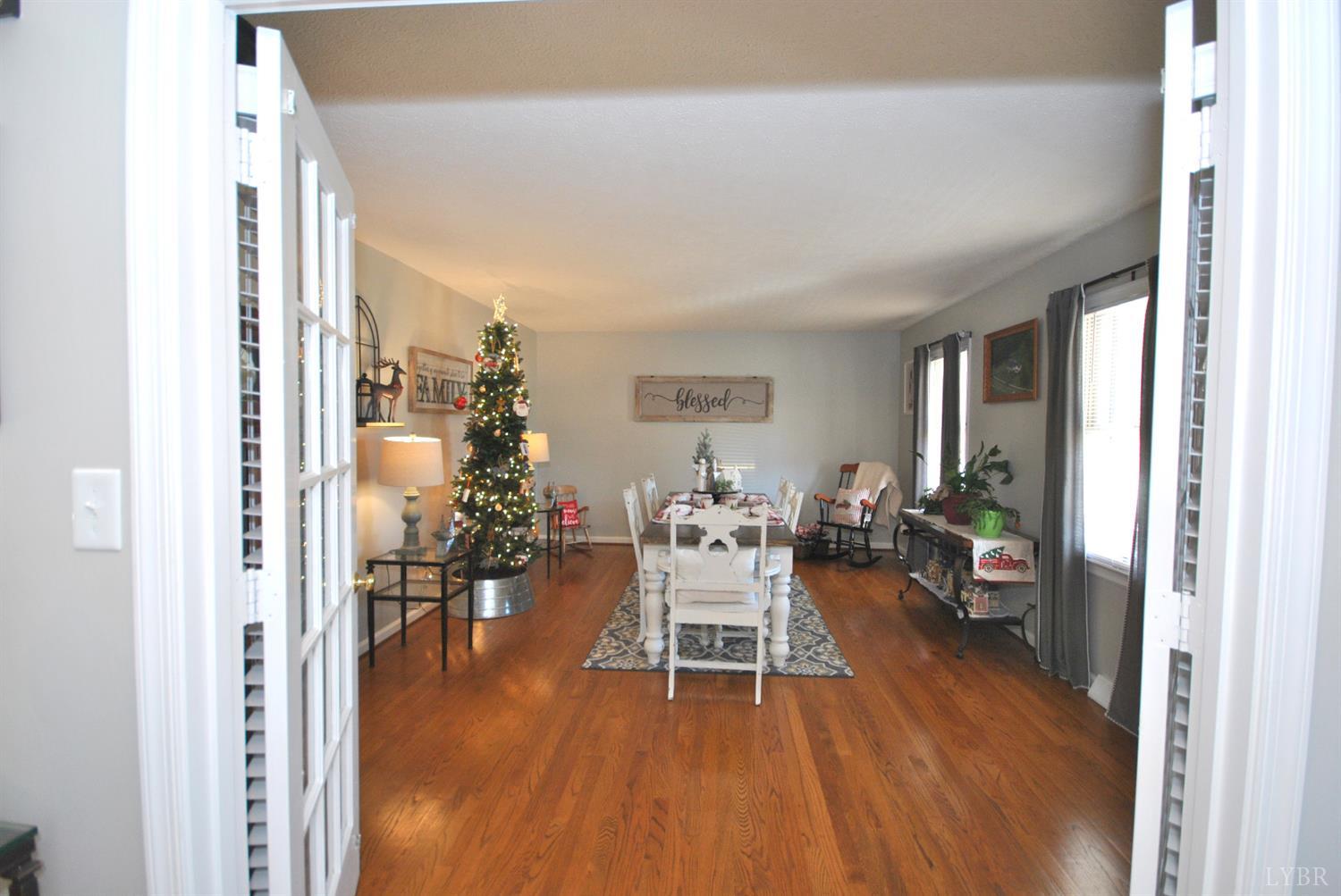 3350 Roaring Run Road Goode, VA 24556 - Photo 16 of 90 a living room with furniture and wooden floor