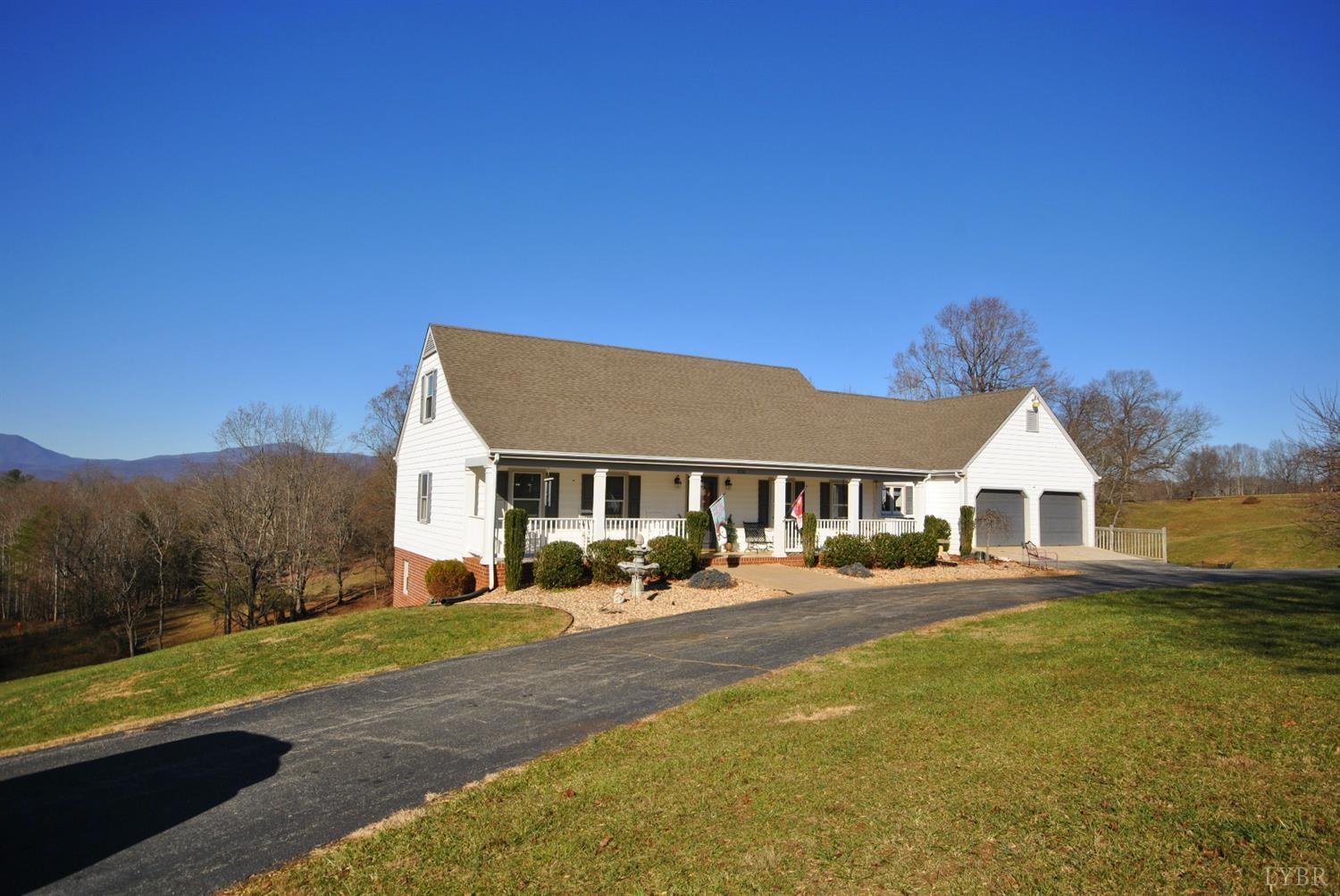 3350 Roaring Run Road Goode, VA 24556 - Photo 2 of 90 a front view of a house with a yard