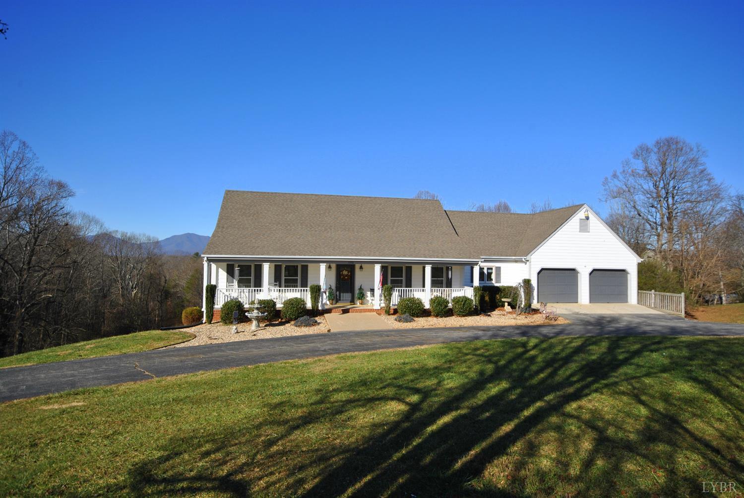 3350 Roaring Run Road Goode, VA 24556 - Photo 3 of 90 a front view of a house with a yard