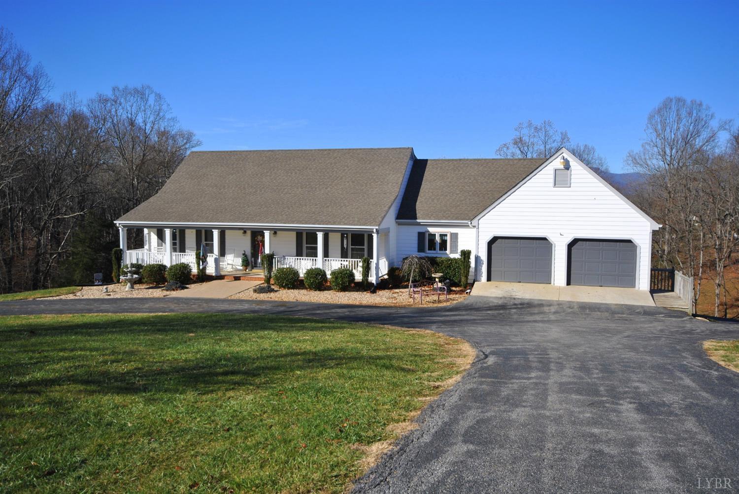 3350 Roaring Run Road Goode, VA 24556 - Photo 4 of 90 a front view of a house with yard and green space