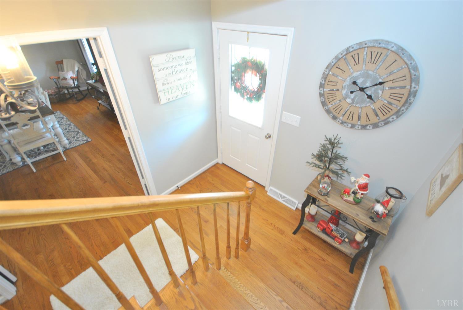 3350 Roaring Run Road Goode, VA 24556 - Photo 53 of 90 Going to main level from upstairs / front door
