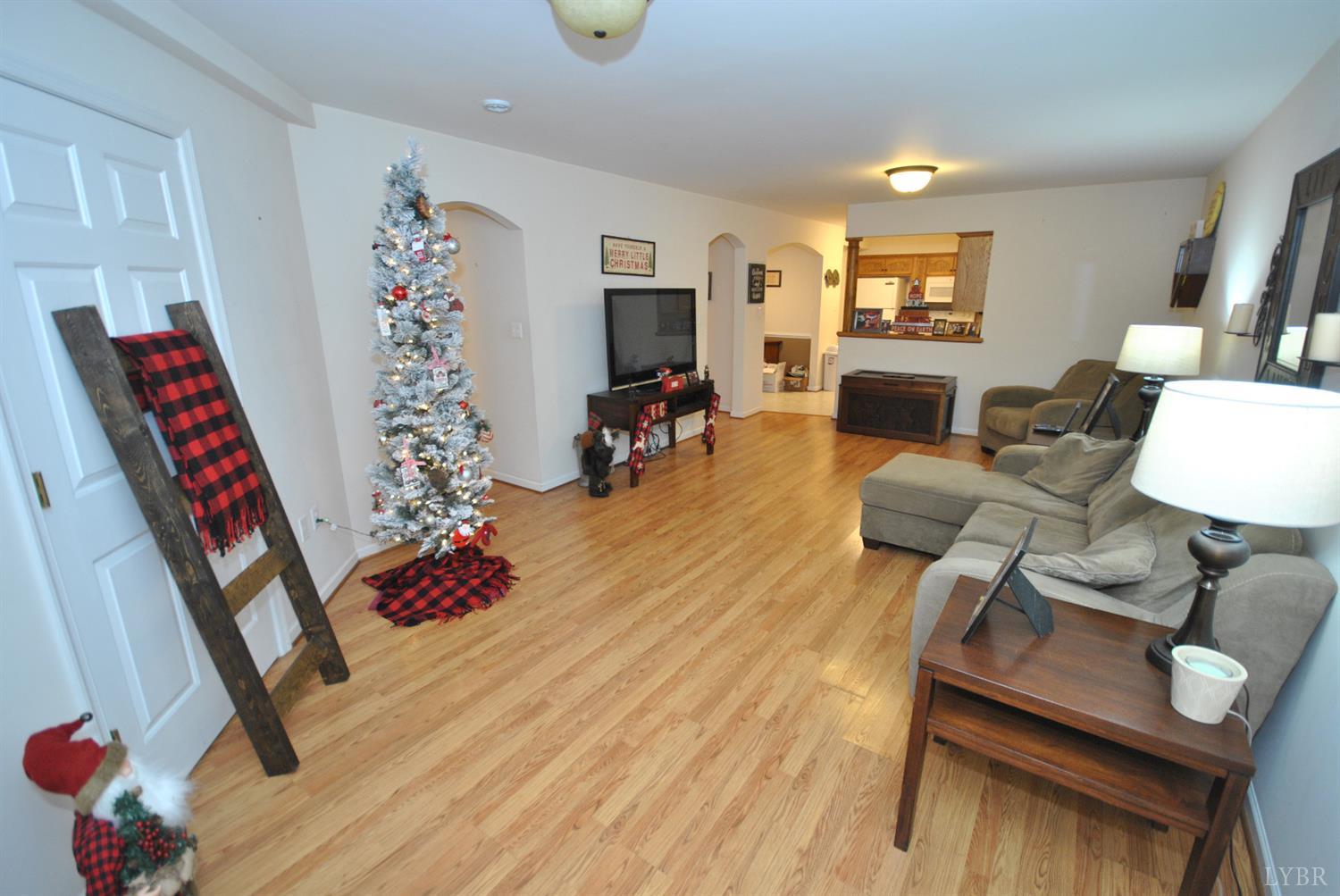 3350 Roaring Run Road Goode, VA 24556 - Photo 55 of 90 a living room with furniture and a flat screen tv