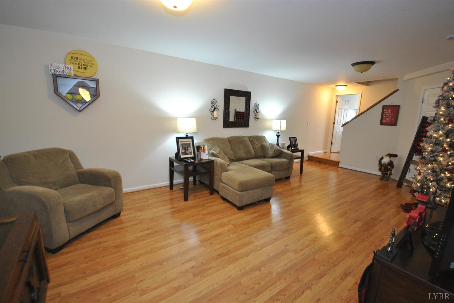 3350 Roaring Run Road Goode, VA 24556 - Photo 58 of 90 a living room with furniture and a couch