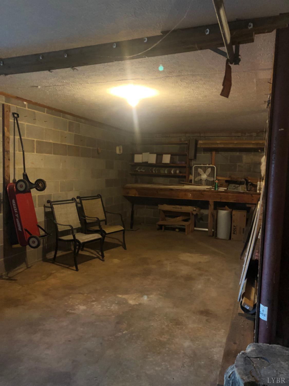 3350 Roaring Run Road Goode, VA 24556 - Photo 90 of 90 a view of a room with gym equipment