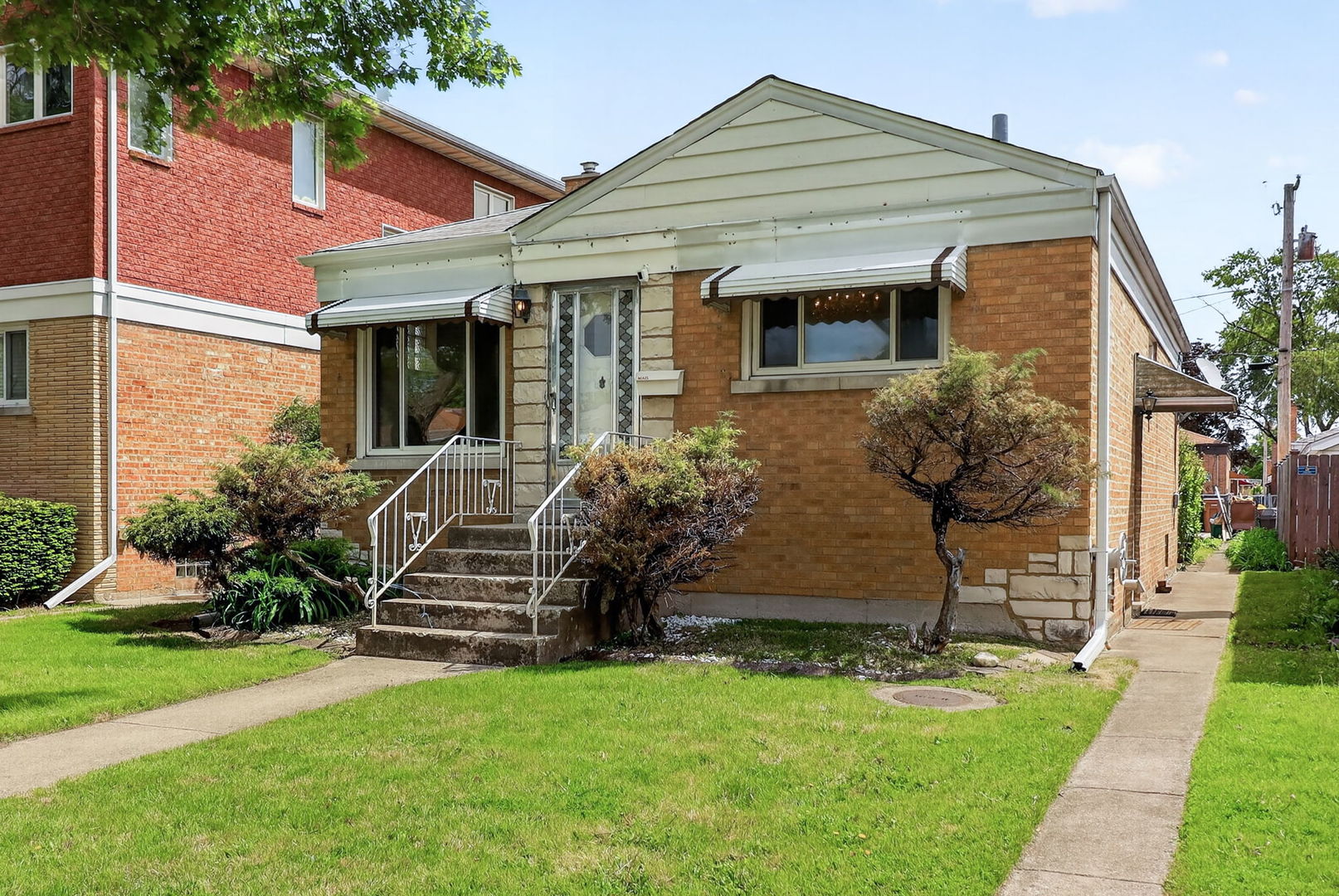 2213 Park Avenue North Riverside, IL 60546 - Photo 2 of 20 a front view of a house with a yard