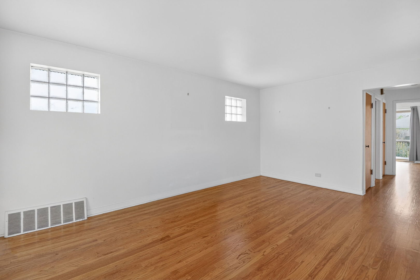 2213 Park Avenue North Riverside, IL 60546 - Photo 4 of 20 a view of empty room with wooden floor and fan