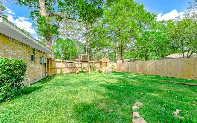 a view of backyard with green space
