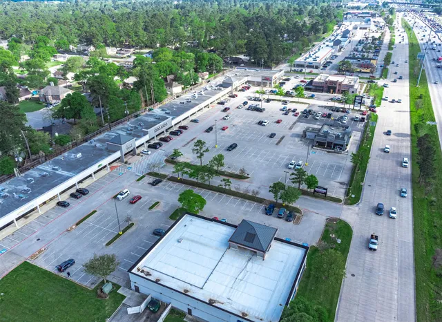 an aerial view of a house with a garden