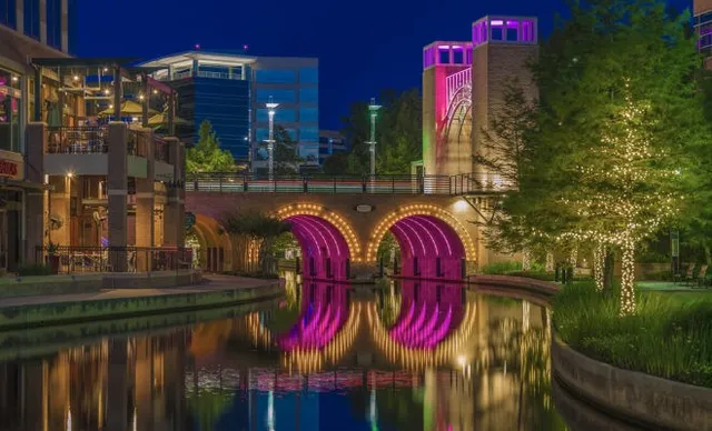 a view of water fountain in front of building