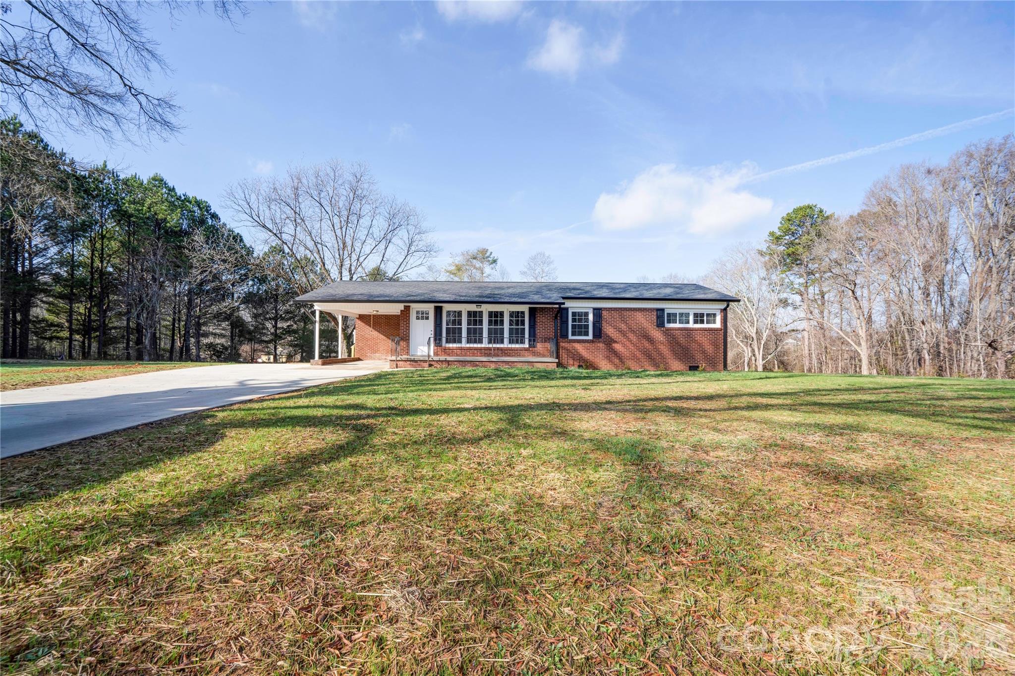 2822 Bettis Road Grover, NC 28073 - Photo 4 of 32 a house view with swimming pool in front of it