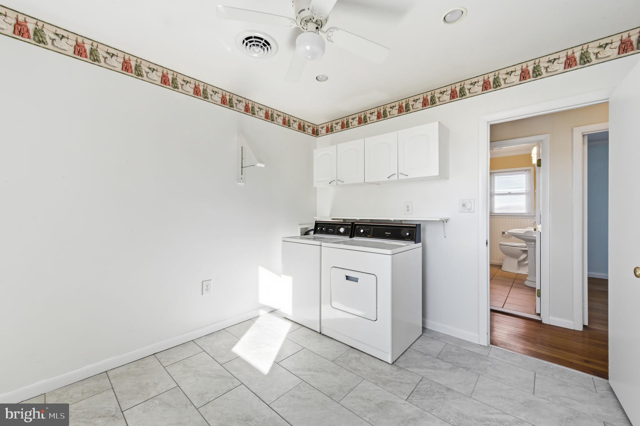 24339 Chestertown Road Chestertown, MD 21620 - Photo 20 of 35 a view of kitchen with cabinets and window