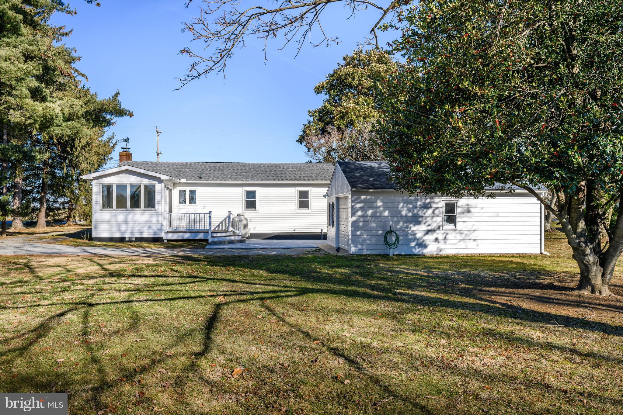 24339 Chestertown Road Chestertown, MD 21620 - Photo 24 of 35 a view of swimming pool with outdoor seating and yard