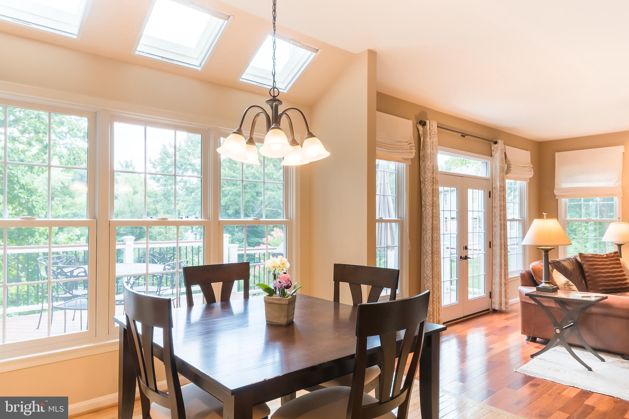8156 Ridge Creek Way Springfield, VA 22153 - Photo 16 of 57 Breakfast room opening to the den