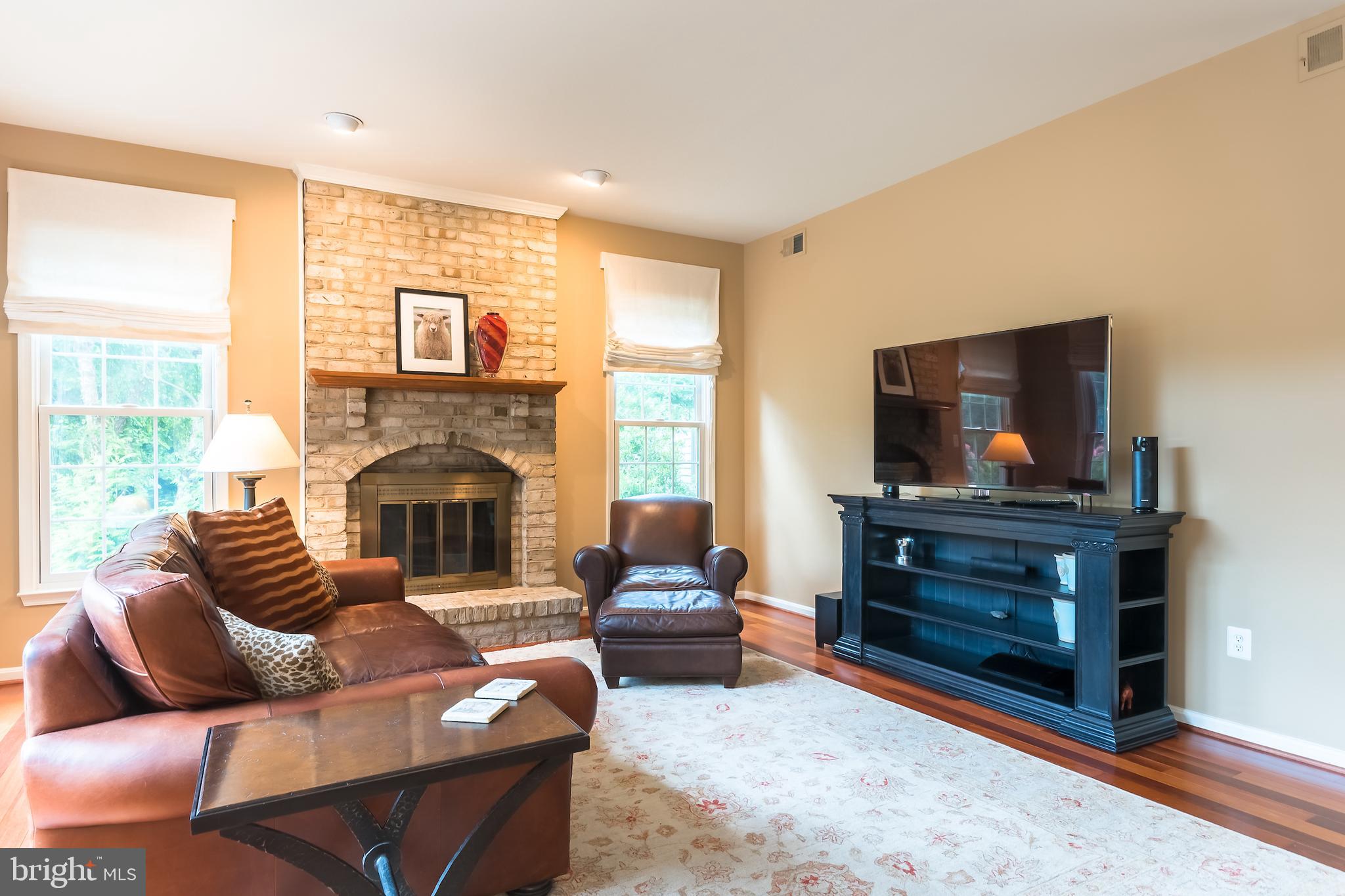 8156 Ridge Creek Way Springfield, VA 22153 - Photo 20 of 57 Den w/ cozy fireplace