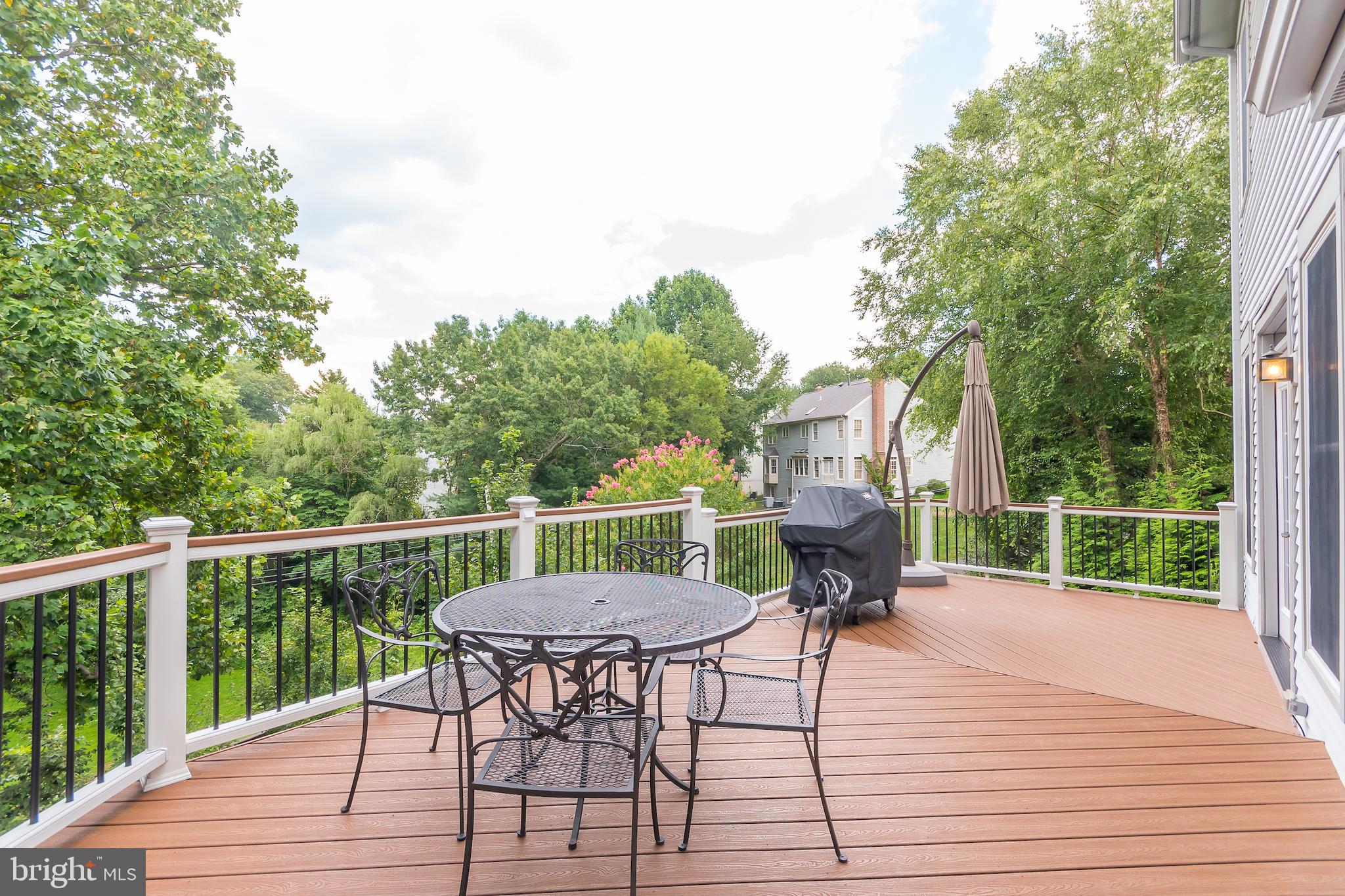 8156 Ridge Creek Way Springfield, VA 22153 - Photo 25 of 57 Deck overlooking lush landscaping