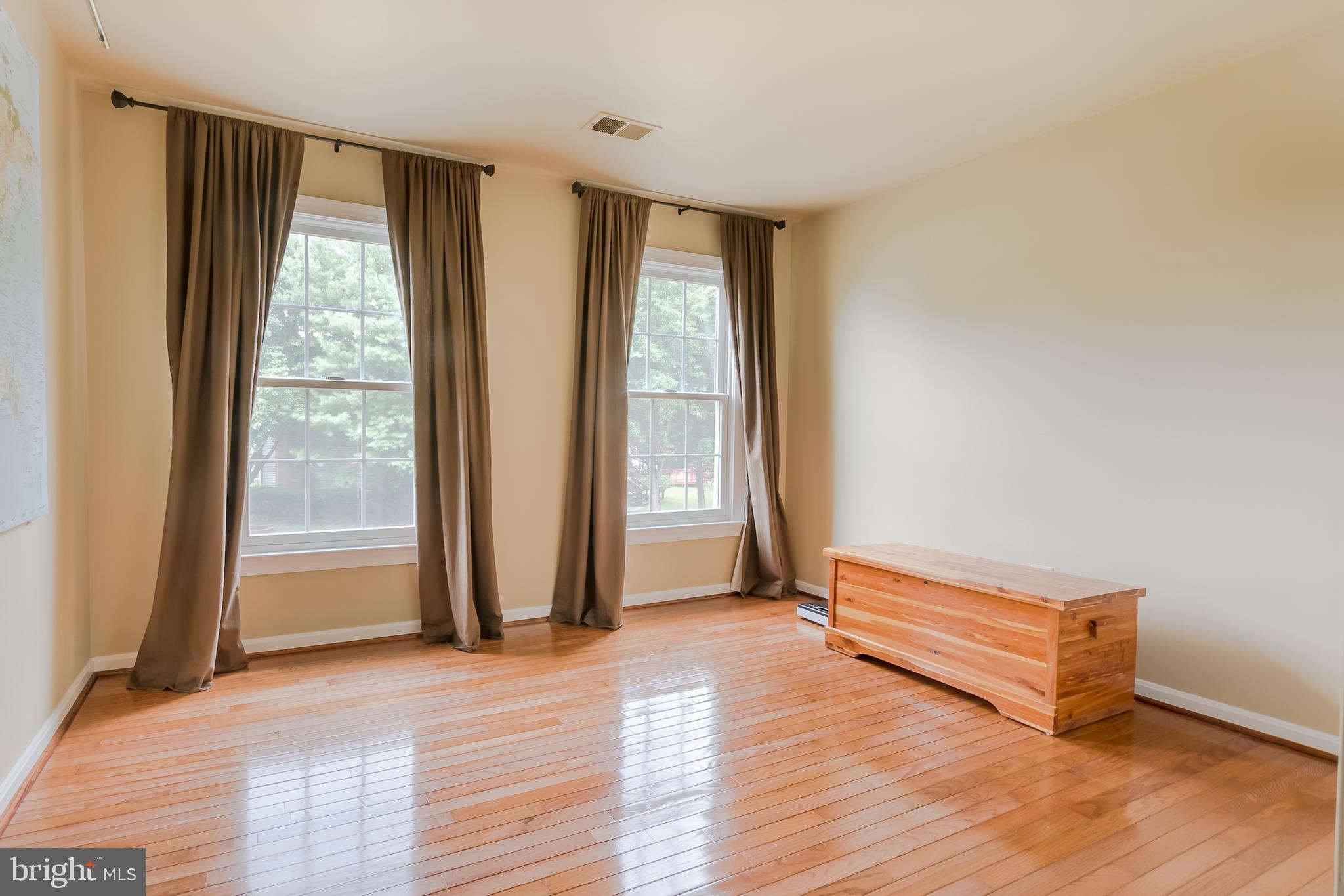 8156 Ridge Creek Way Springfield, VA 22153 - Photo 32 of 57 Bedroom #2 with gleaming hardwood floors
