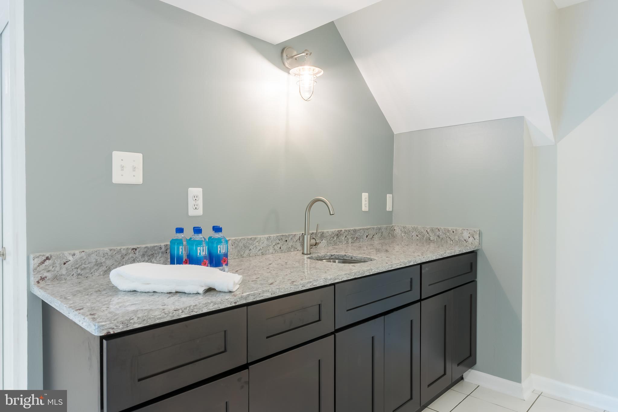8156 Ridge Creek Way Springfield, VA 22153 - Photo 47 of 57 New wet bar in basement