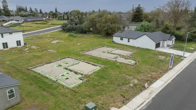 a view of a pool with a yard
