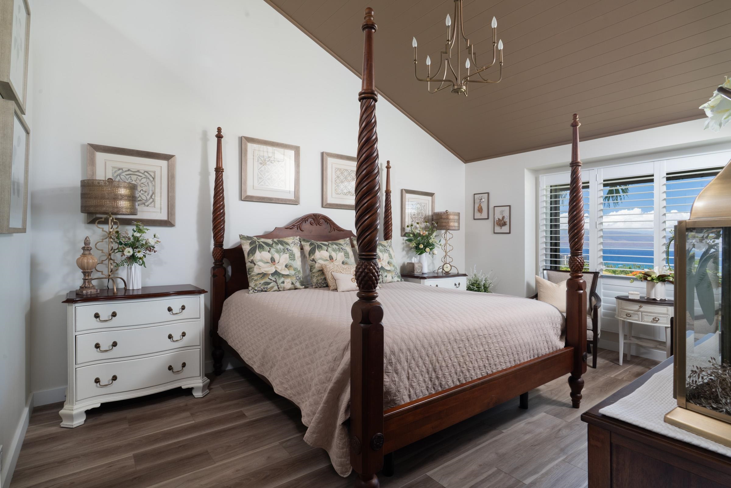 50 Puu Anoano Street, Unit 2804 Lahaina, HI 96761 - Photo 22 of 49 a bedroom with a bed and wooden floor