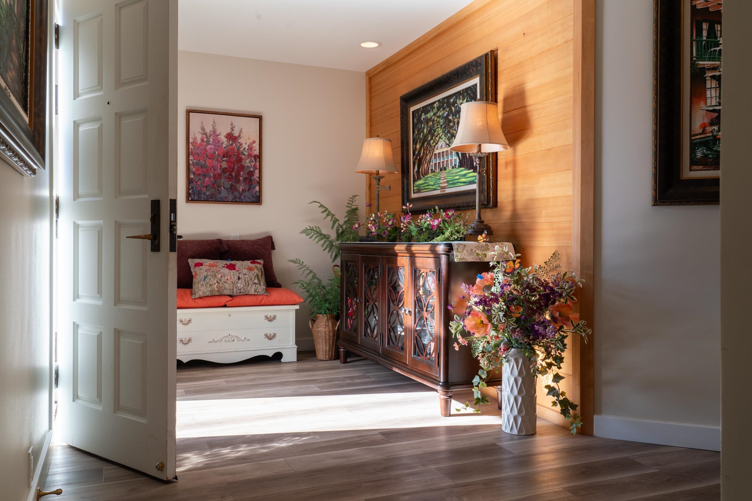 50 Puu Anoano Street, Unit 2804 Lahaina, HI 96761 - Photo 5 of 49 a living room with furniture and a potted plant