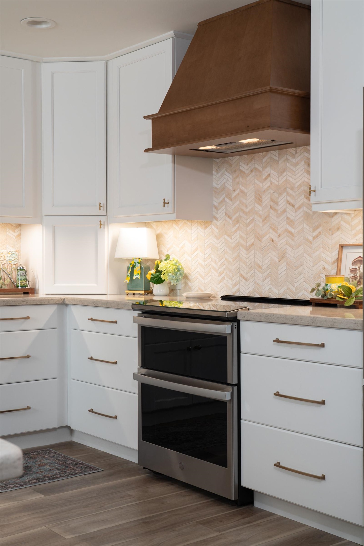 50 Puu Anoano Street, Unit 2804 Lahaina, HI 96761 - Photo 9 of 49 a kitchen with white cabinets and appliances