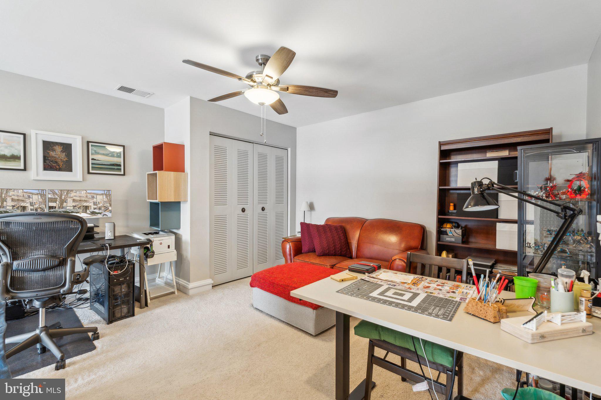 10108 Hellingly Place, Unit 300 Gaithersburg, MD 20886 - Photo 18 of 22 a living room with furniture a rug and a window
