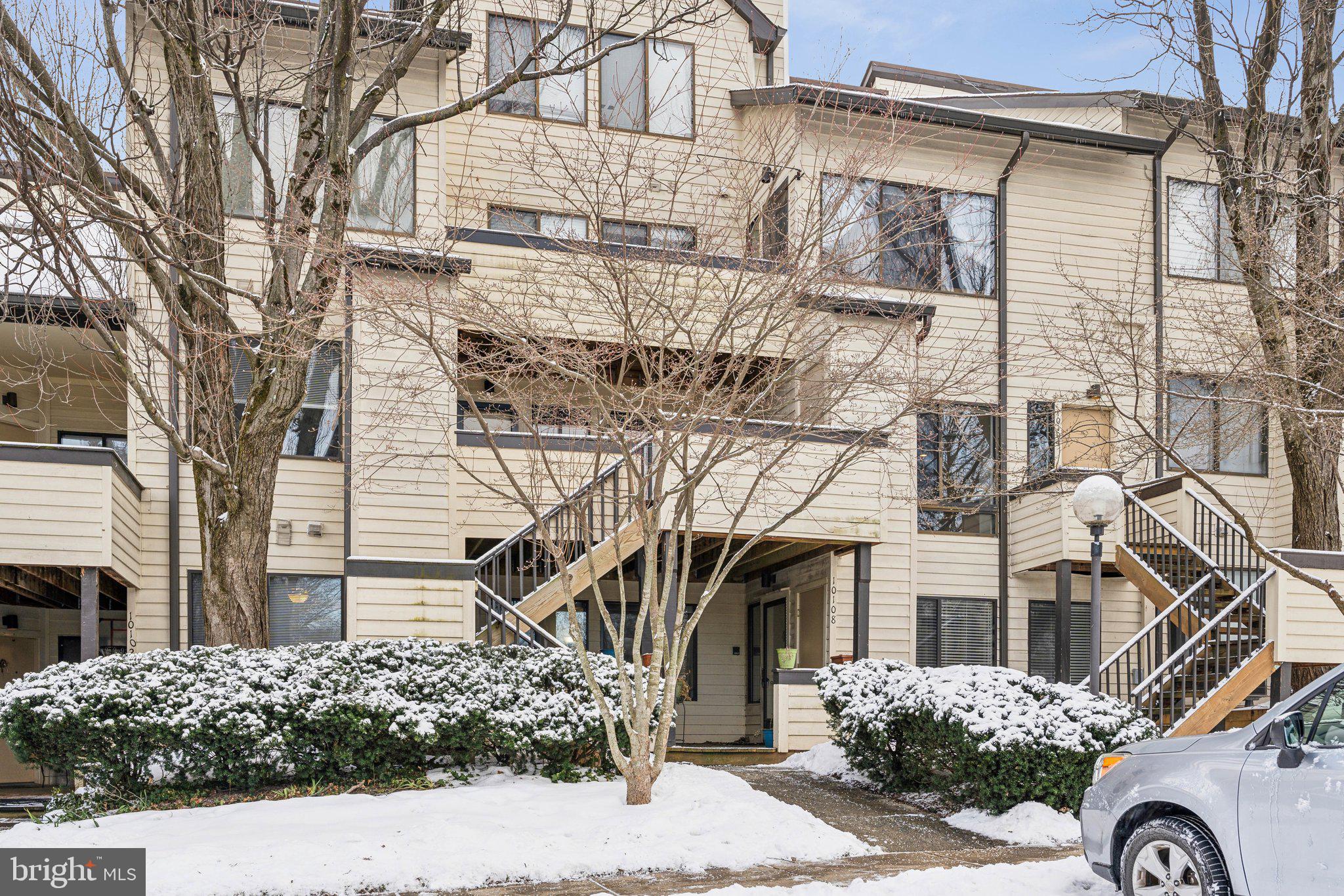 10108 Hellingly Place, Unit 300 Gaithersburg, MD 20886 - Photo 22 of 22 a view of a house with a yard