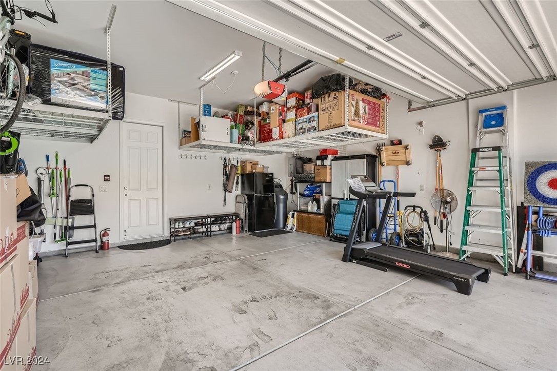 920 Everest Peak Avenue Henderson, NV 89012 - Photo 24 of 34 2 Car Garage with Overhead Shelves
