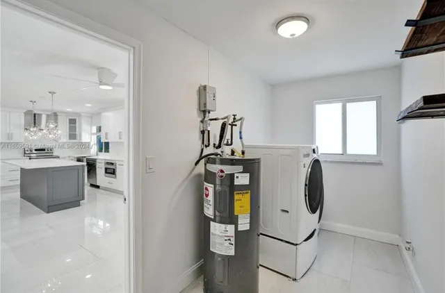 a view of kitchen and washer and dryer