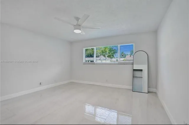 a bathroom with a sink double vanity and a mirror