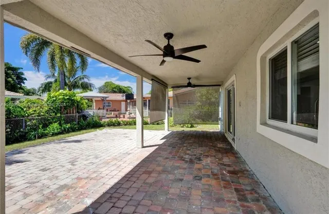 a view of a porch with a tv