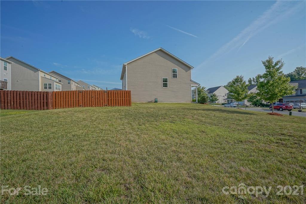 285 Almora Loop Mooresville, NC 28115 - Photo 37 of 45 a view of a backyard