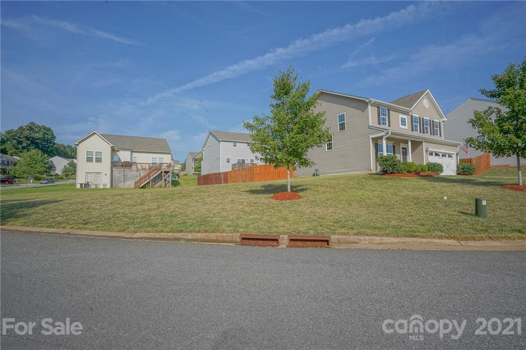 285 Almora Loop Mooresville, NC 28115 - Photo 39 of 45 a view of a house with a yard