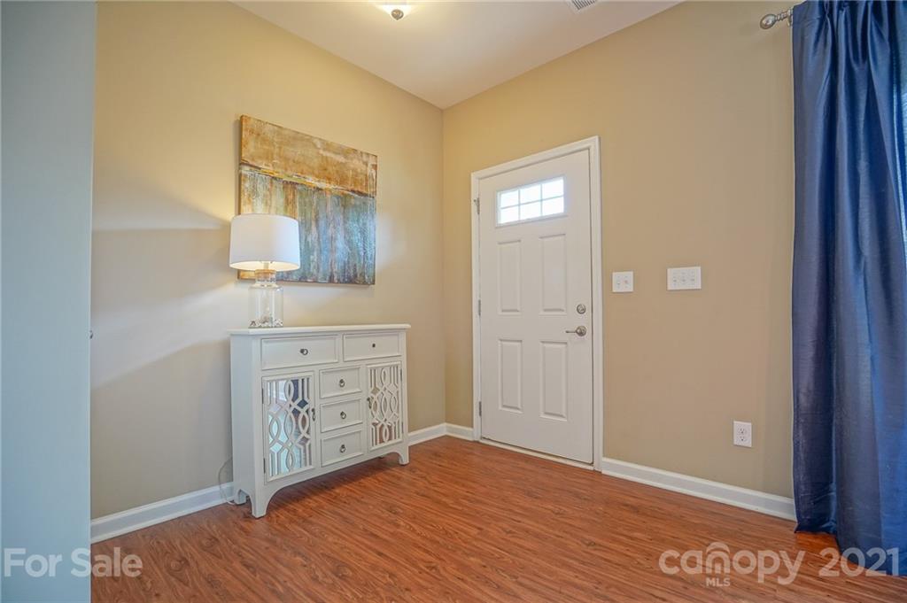 285 Almora Loop Mooresville, NC 28115 - Photo 5 of 45 a view of a bedroom from the hallway