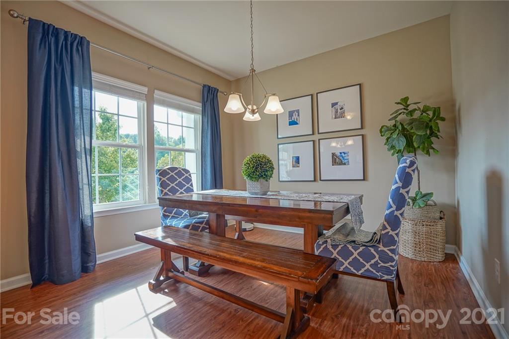 285 Almora Loop Mooresville, NC 28115 - Photo 6 of 45 a living room with furniture and a window