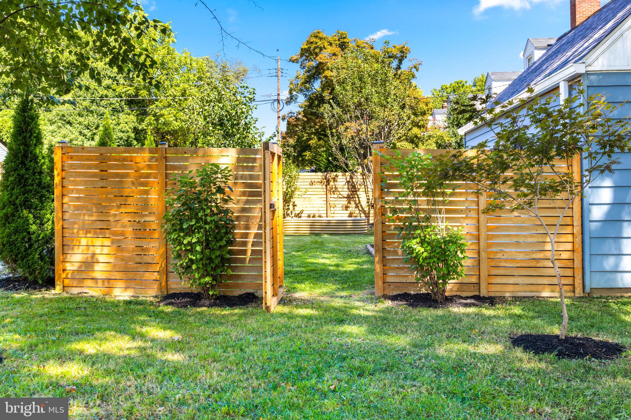 1114 Arran Road Baltimore, MD 21239 - Photo 3 of 49 Wood privacy fenced tranquil backyard
