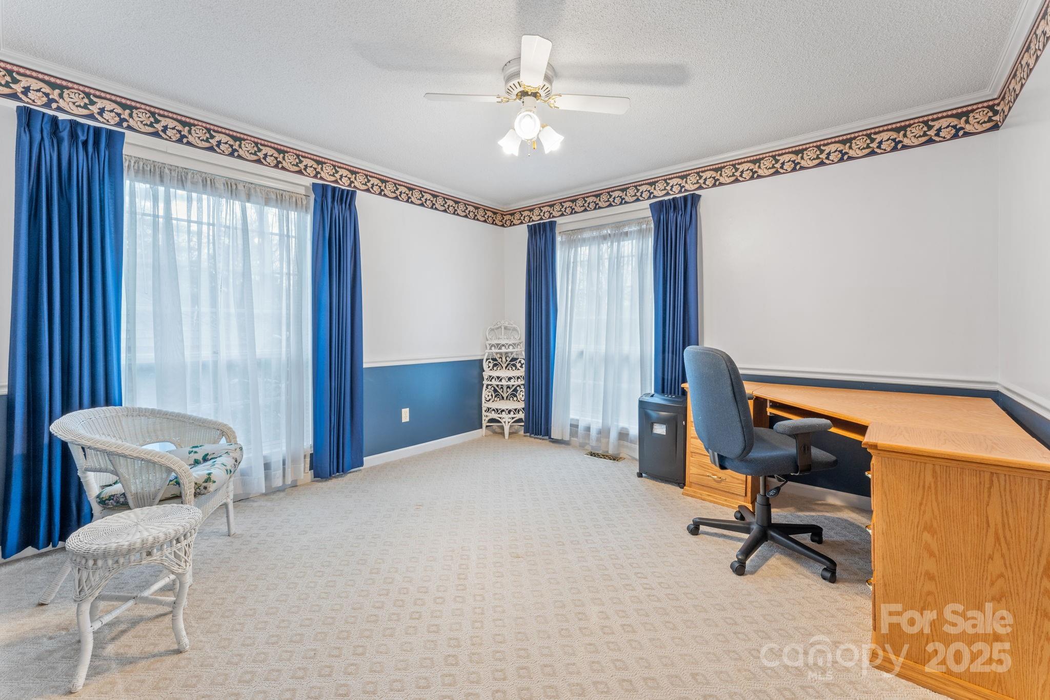 184 Trimont Mountain Road Franklin, NC 28734 - Photo 22 of 41 a view of a workspace with furniture and a window