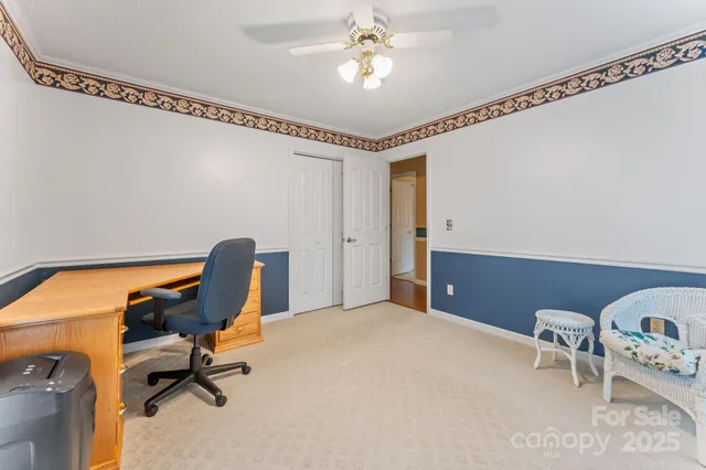 a workspace with chandelier