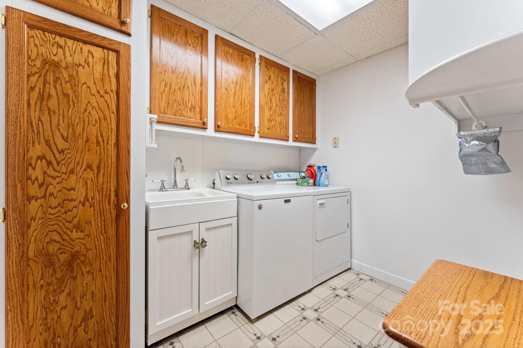 184 Trimont Mountain Road Franklin, NC 28734 - Photo 27 of 41 a bathroom with a sink and a mirror