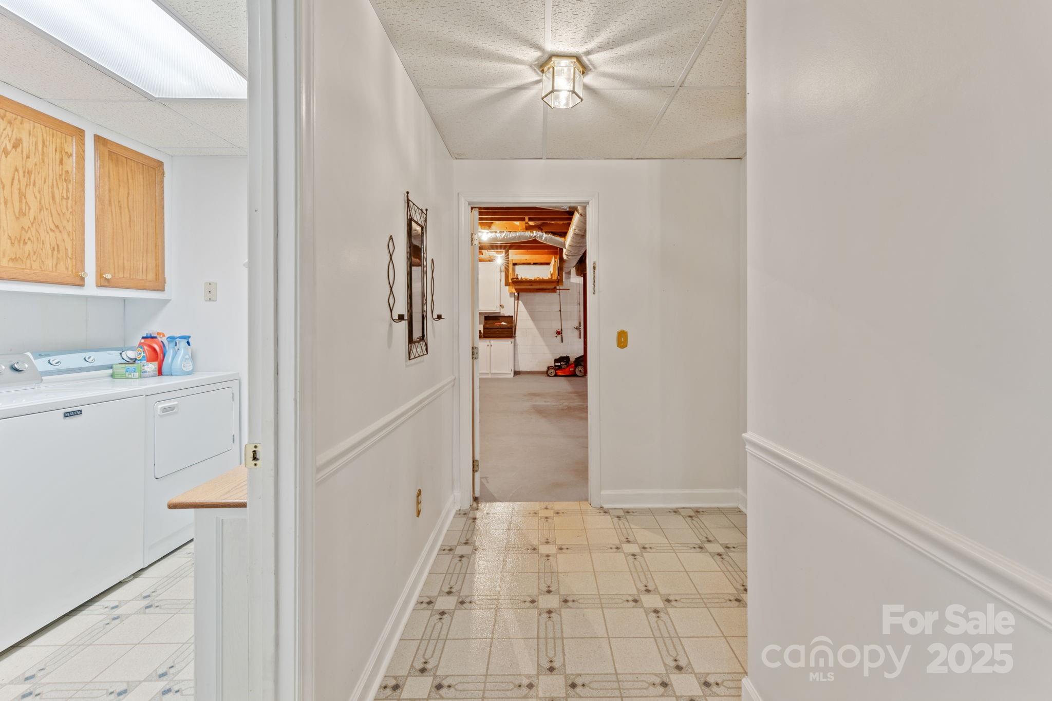 184 Trimont Mountain Road Franklin, NC 28734 - Photo 29 of 41 a view of a hallway view with wooden floor and staircase