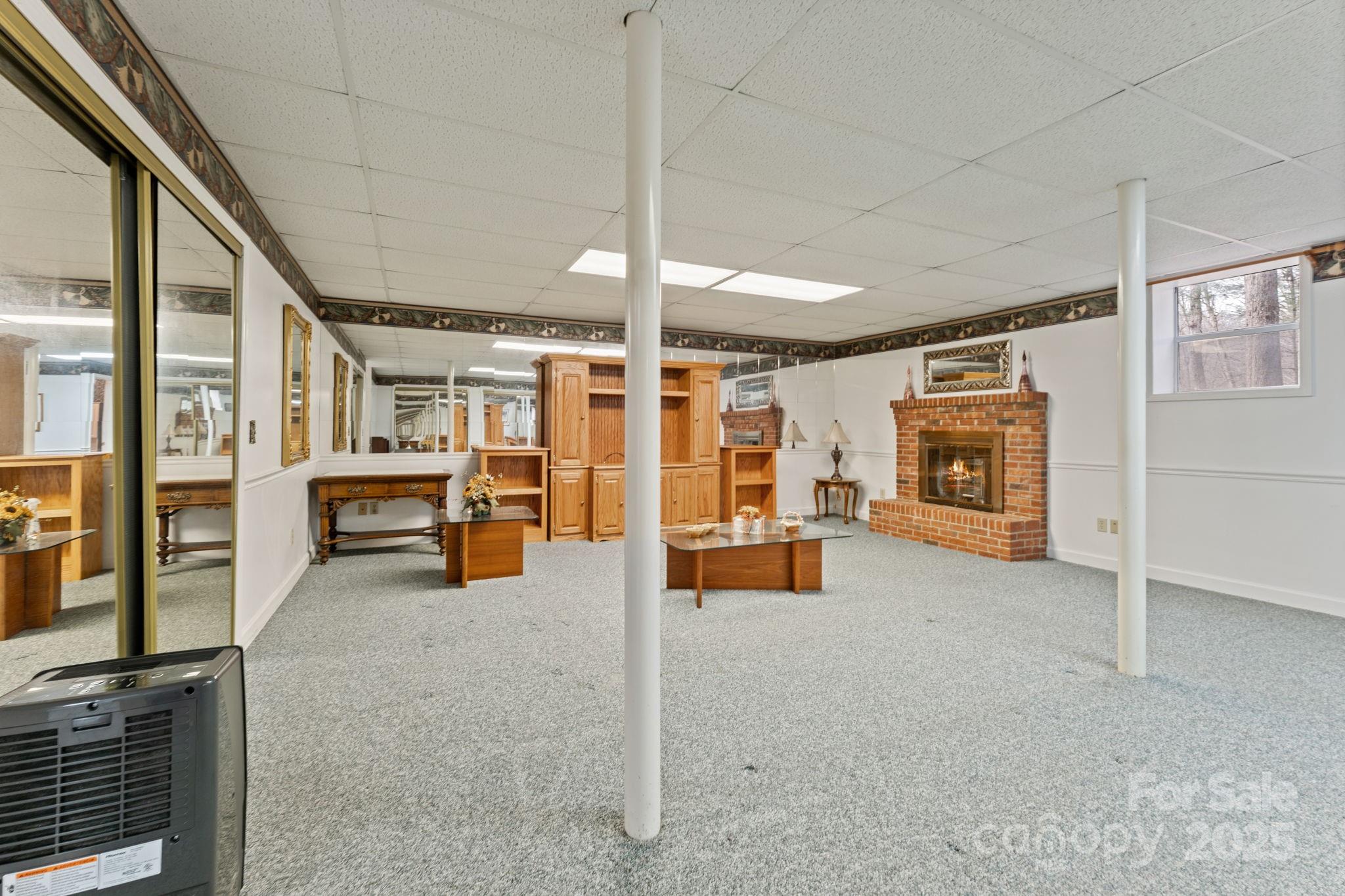 184 Trimont Mountain Road Franklin, NC 28734 - Photo 30 of 41 a view of living room with furniture and fireplace