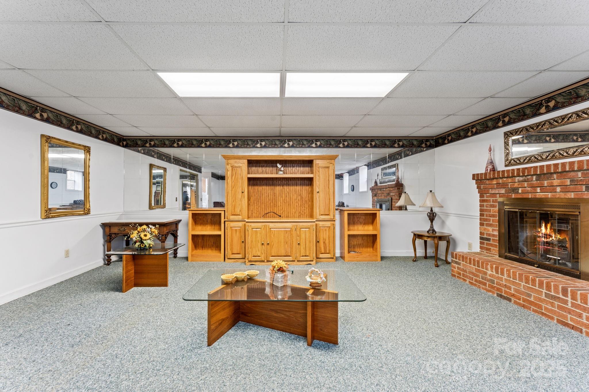 184 Trimont Mountain Road Franklin, NC 28734 - Photo 31 of 41 a living room with furniture and a fireplace