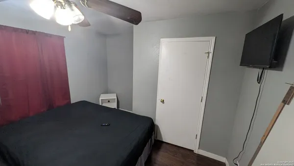 a view of a bedroom with a small space