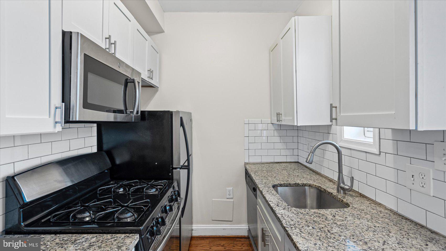 847 Carroll Street Baltimore, MD 21230 - Photo 6 of 33 Modern kitchen with sleek finishes.